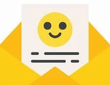 Yellow envelope with a smiley face letter emerging from it.