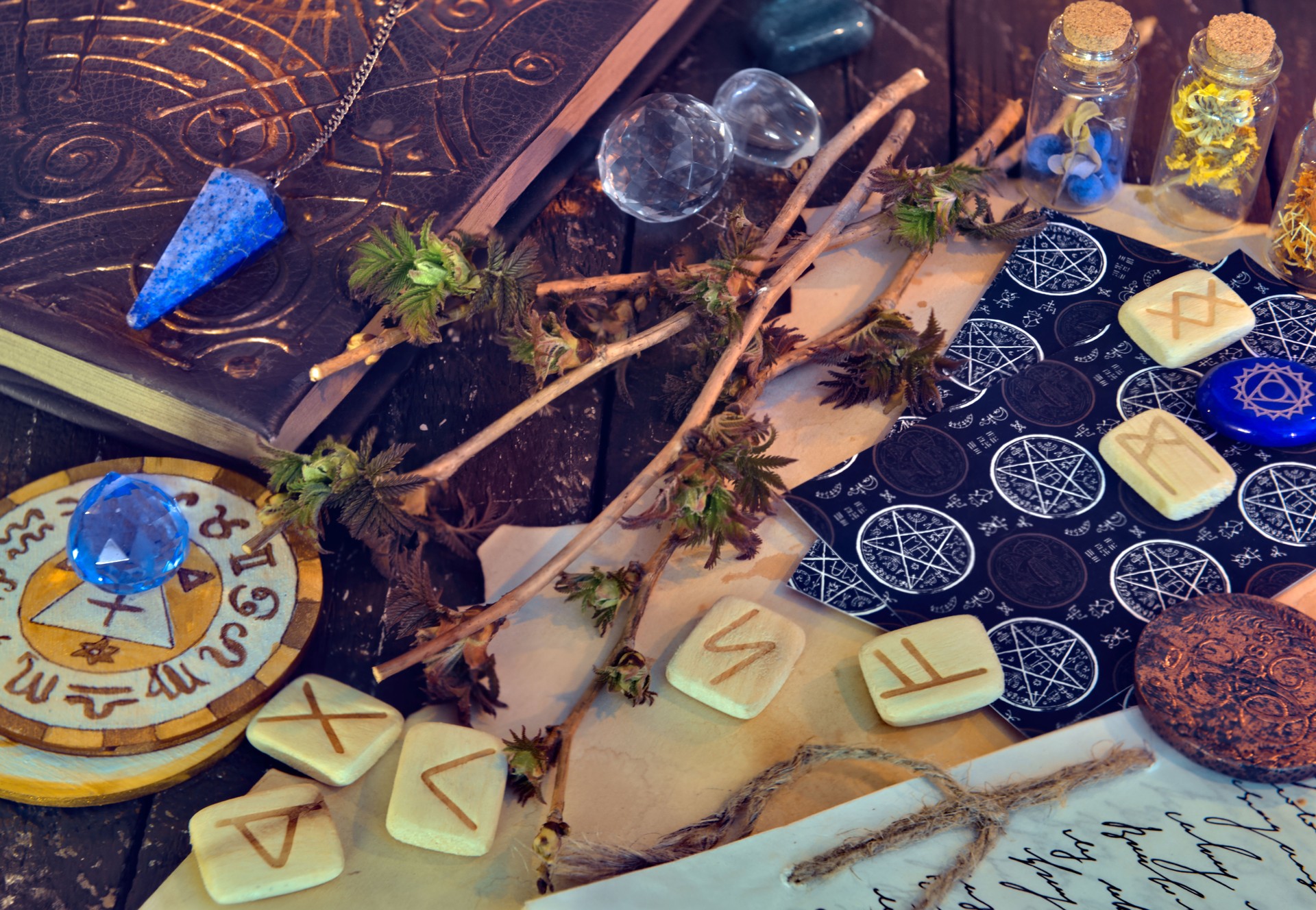 Wicca, esoteric and occult still life with vintage magic objects on witch table altar for mystic rituals and fortune telling. Halloween and gothic concept